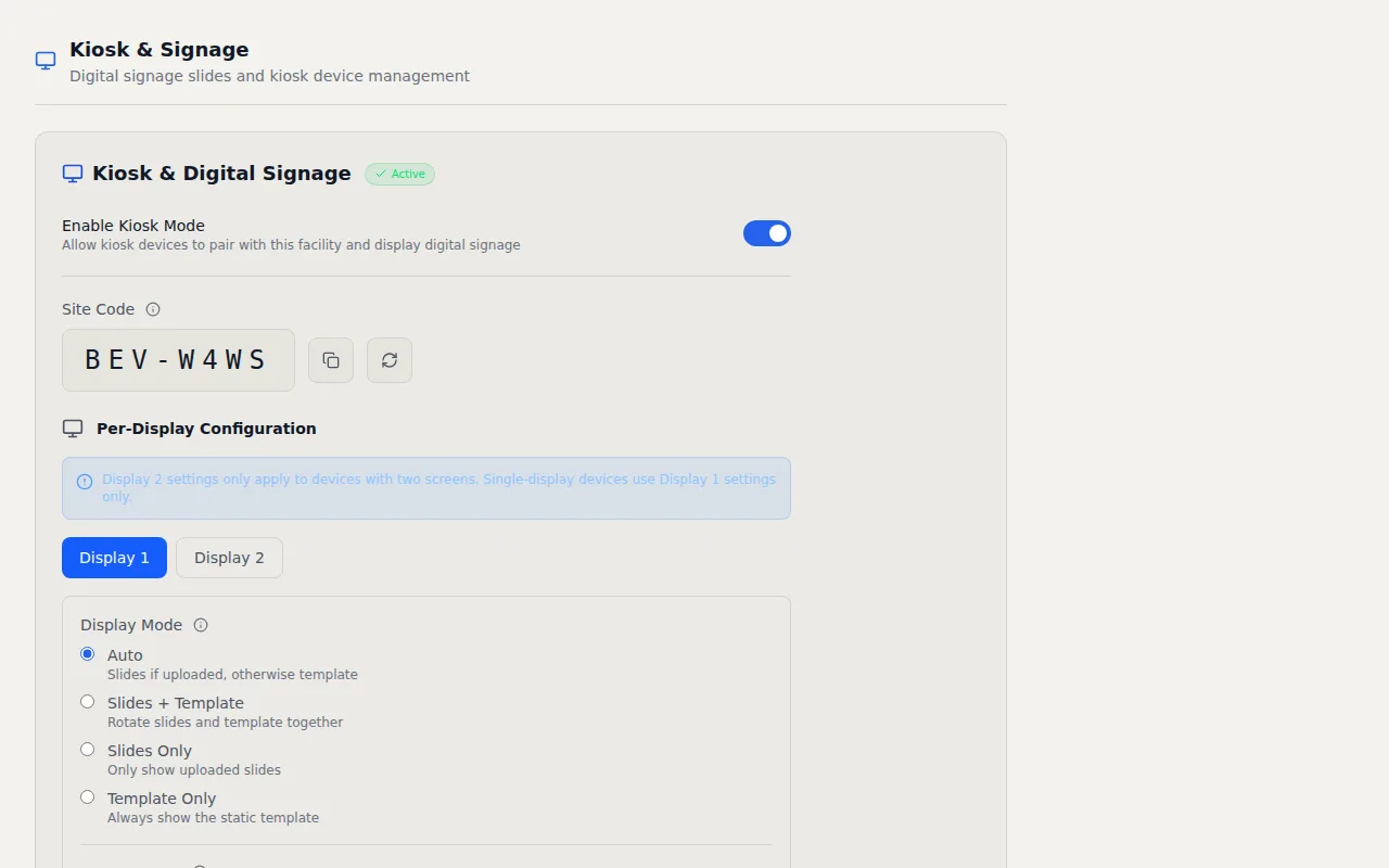 VisitorLog kiosk device management showing paired devices, display modes, and slideshow configuration